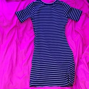 Striped short sleeve tight dress. It Says XL but it fits like a Medium